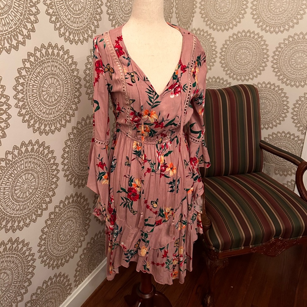 Unknown designer, size medium, bohemian dress with flowing sleeves.